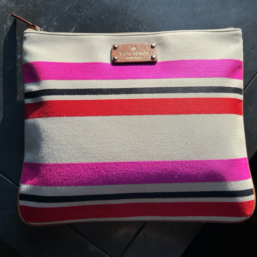Kate Spade striped clutch bag.